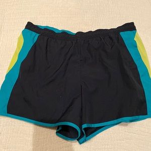 Adidas shorts, gently used, has 3 white specks on front (shown in picture).